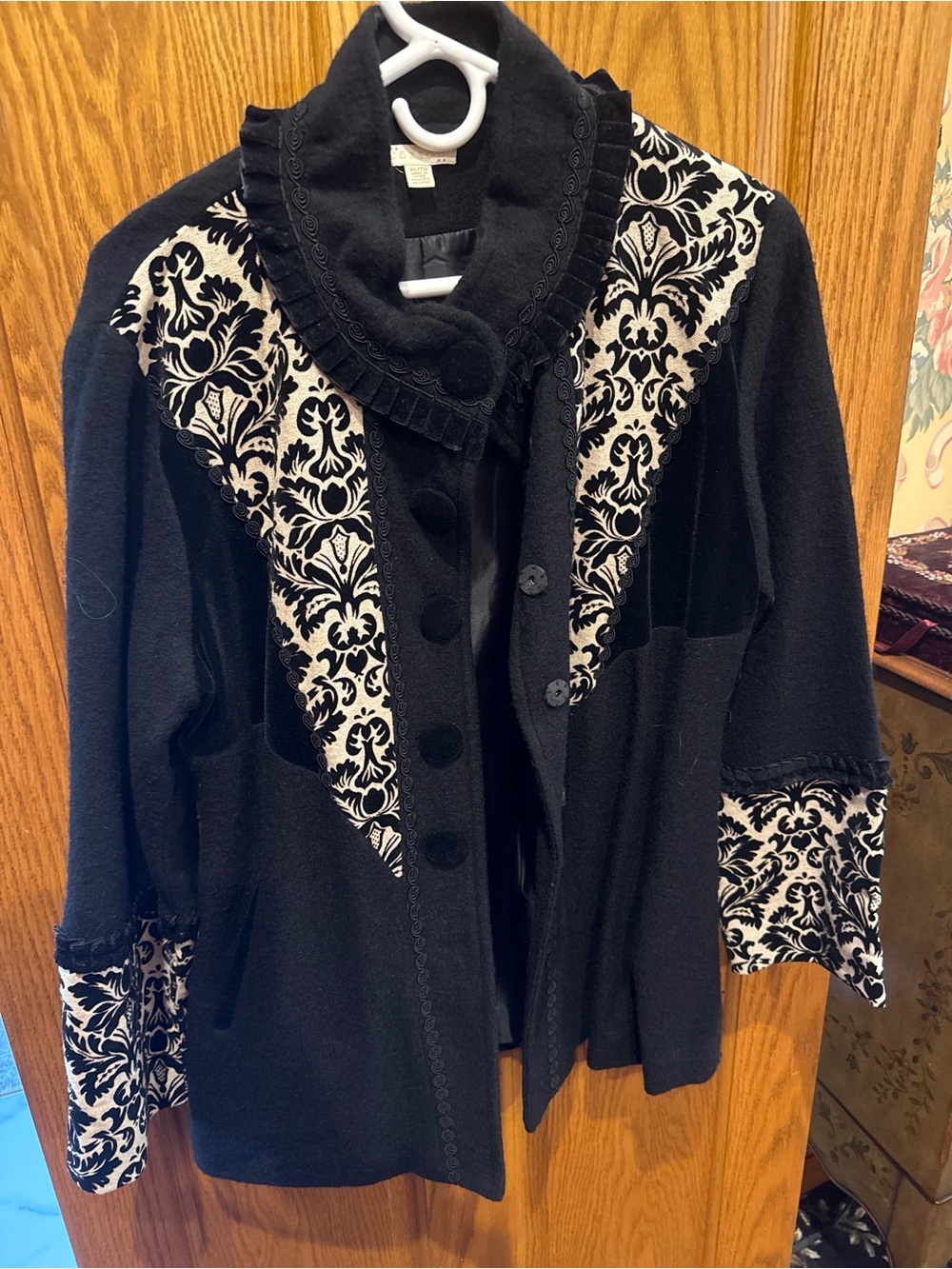Black Coat with black and white Trim